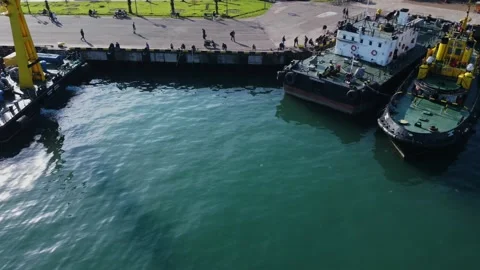 Aerial view floating crane at the pier, workers cleaning the barge Stock Footage 232470345