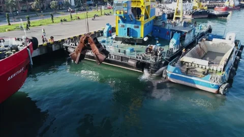 Aerial view floating crane at the pier, workers cleaning the barge Stock Footage 232476042
