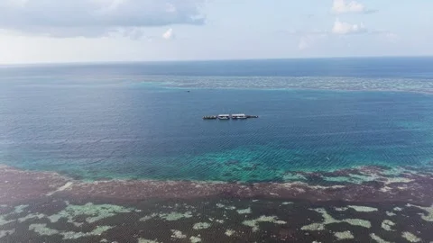 Aerial view of a floating platform in the sea, Indonesia. Stock Footage 346896700