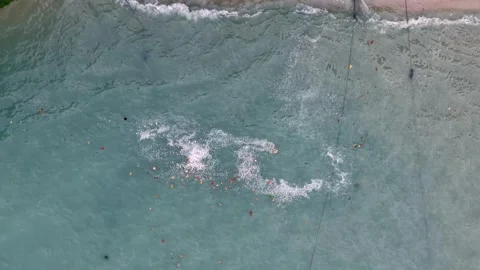 Aerial View of Floating Rubbish and Debris in Sea Water Видео 345835249