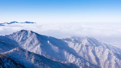 Aerial view of floating sea of clouds  in Deogyusan mountain in early morning. Video stock 102270920