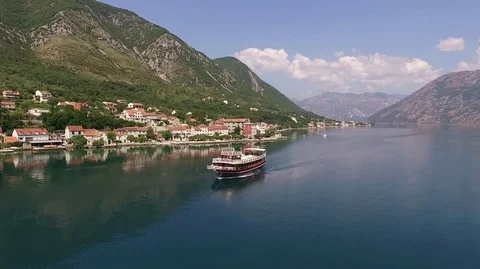 Aerial view of a floating ship on the Bay of Kotor in Montenegro Stock Footage 100771026
