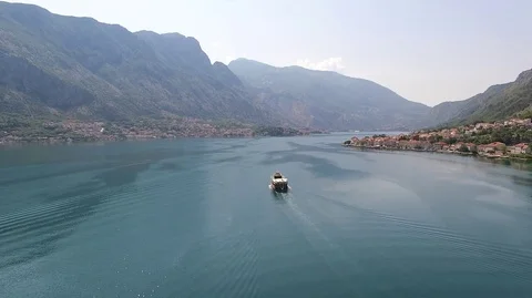 Aerial view of a floating ship on the Bay of Kotor in Montenegro Stock Footage 100771074
