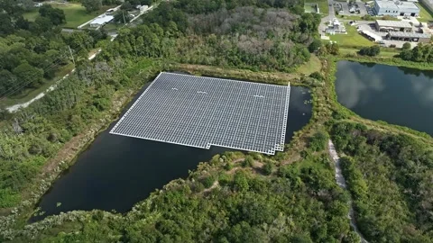Aerial View of Floating Solar Panel Array on Retention Pond Altamonte Springs Stock Footage 320624978