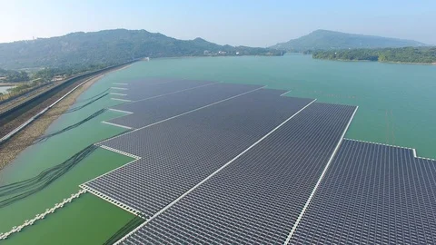 Aerial view of Floating solar panels or solar cell Platform on the lake Stock Footage 100856648