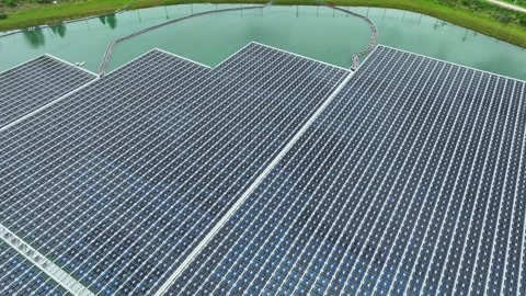 Aerial view of floating solar technology installed on a reservoir. Stock Footage 340134854