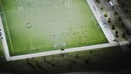 Aerial View Of A Floodlit Soccer Match At Night Stock Footage
