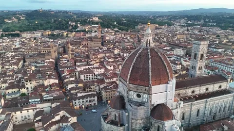 Aerial view of Florence, Italy, featuring the magnificent Cathedral Stock Footage 345659542