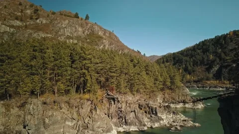 Aerial view flow of the mountain green river Katun. A beautiful autumn mountain Stock Footage 149476372