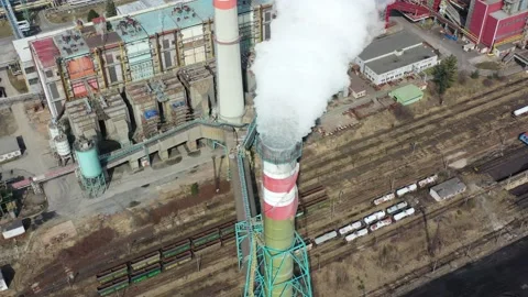 Aerial view of flue gas stack, coal fired thermal power plant and air Stock Footage 152820241