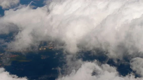 Aerial view of fluffy clouds over city Stock Footage 224097089