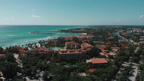 Aerial view fly forward of the city and sea in Mexico on a sunny day in winter Stock Footage 167843973