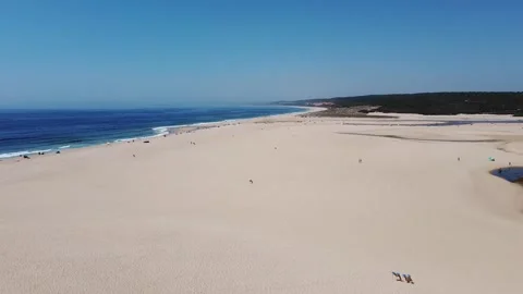 Aerial view of fly by over beach Stock Footage 160423193
