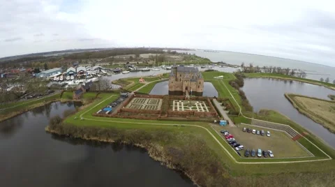Aerial view fly over front of Muider Castle in Dutch Muiderslot Muiden 4k Stock Footage 61393973