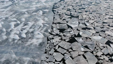 Aerial view fly over ice floes in ice covered sea Stock Footage 170385456