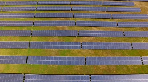 Aerial view Fly Over Solar Power Panels Field Green Energy Clean Energy Stock Footage 62932827