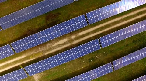 Aerial view Fly Over Solar Power Panels Field Green Energy Clean Energy Stock Footage 62932845
