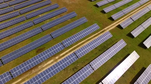 Aerial view Fly Over Solar Power Panels Field Green Energy Clean Energy Stock Footage 62932985