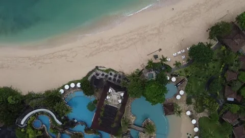 Aerial view fly over white sand and lagoon at Nusa Dua Beach Bali, Indonesia Stock Footage 197012755