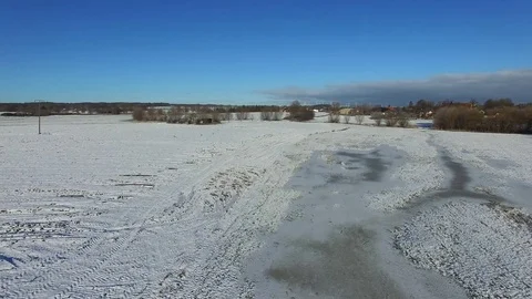 Aerial view fly over winter forrest landscape with blue sky in germany Stock Footage 71484301