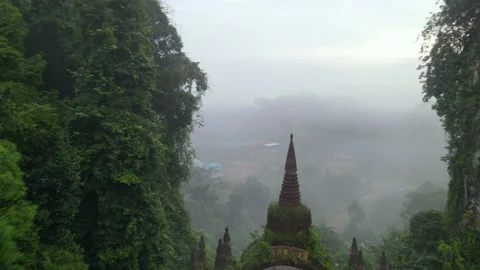 Aerial view of fly through and over gate with pagoda on top and stay out Stock Footage 142094315
