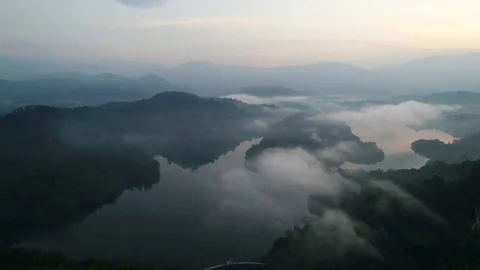 Aerial view. Flying above clouds while viewing beautiful landscape. Video stock 82045072