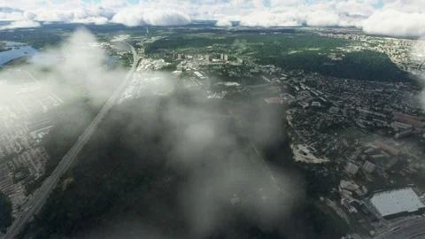 Aerial view flying above the clouds of the city of Kyiv. Ukraine Stock Footage 244135655