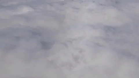 Aerial view flying above a layer of soft white clouds 스톡 동영상 344873862