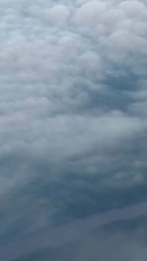 Aerial view flying above white cumulus clouds Stock Footage 344889803