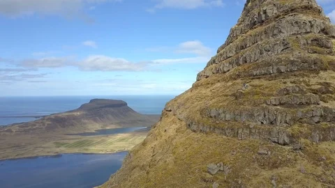 Aerial View Flying Alongside the Iconic Kirkjufell in Iceland Video stock 89219873