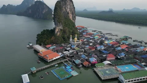 Aerial View Flying Away from Ko Panyi Floating Village in Phang Nga, Thailand Stock Footage 335255076