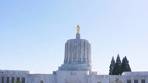 Aerial view flying backwards from the Oregon State Capitol building. Stock Footage 152539853