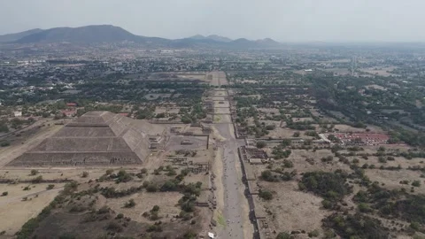 Aerial view flying backwards over the avenue of the dead at the ancient Stock Footage 337912434