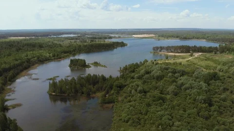 Aerial View. Flying camera over beautiful lakes and green forests. Flying over Stock Footage 108473311