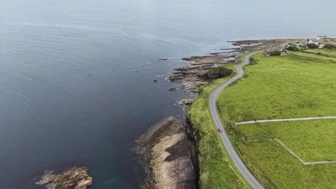 Aerial view flying forward along Mullaghmore Head coast. Stock Footage 341730698