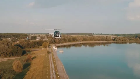 Aerial view of flying helicopter Stock Footage 130439101