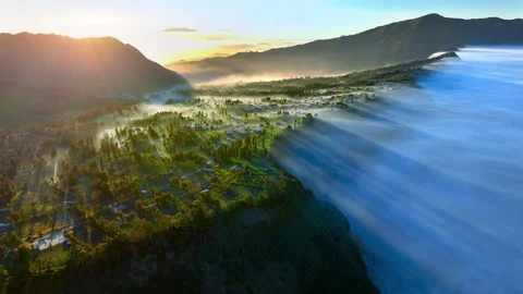 Aerial view flying to mount Bromo at sunrise Stock Footage 304970201