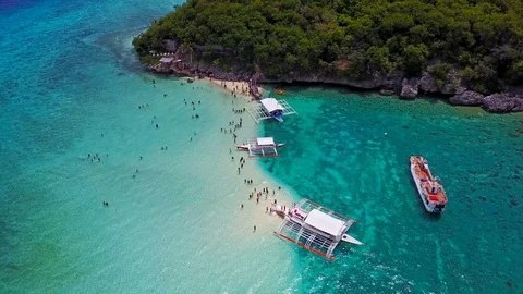 Aerial view flying over amazing of sandy beach sea at Oslob, Cebu, Philippines. Stock Footage