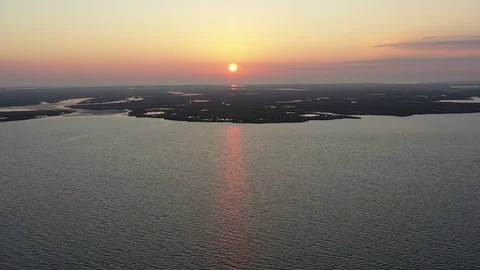 Aerial View Flying Over Bay Into Sunrise Stock Footage 101450261