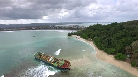 Aerial View Flying Over Beach And Decay Rusty Old Ship, Abandoned Ship Video stock 75885293