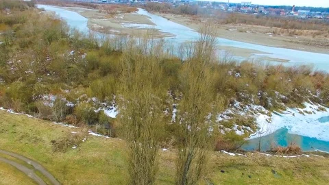 Aerial View. Flying over the beautiful autumn River and two trees Stock Footage 77983365