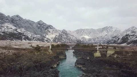 Aerial View. Flying over the beautiful mountain River. Aerial camera shot Video stock 84329005