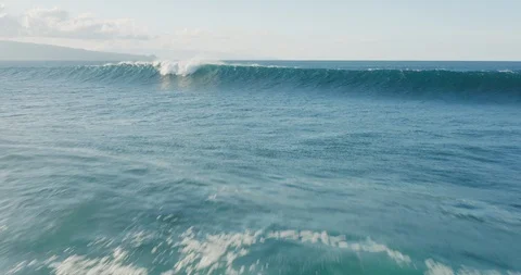 Aerial view flying over big ocean waves Stock Footage 119751125