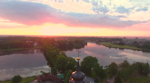 Aerial View. Flying over the castle's old town at sunset with sun rays. Stock Footage 63831223