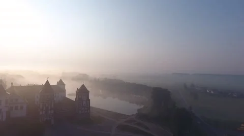 Aerial View. Flying over the castle's old town at sunrise Stock Footage 67776542