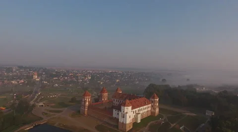 Aerial View. Flying over the castle's old town at sunrise Stock Footage 67813314