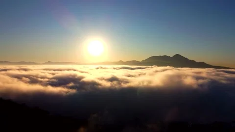 Aerial View: Flying Over Clouds On Sun Rise In Mountains. Stock Footage 169999070