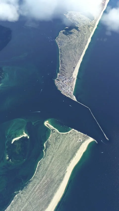 Aerial view flying over the clouds of the City of Faro in Portugal. Portugal Vídeo Stock 283420857