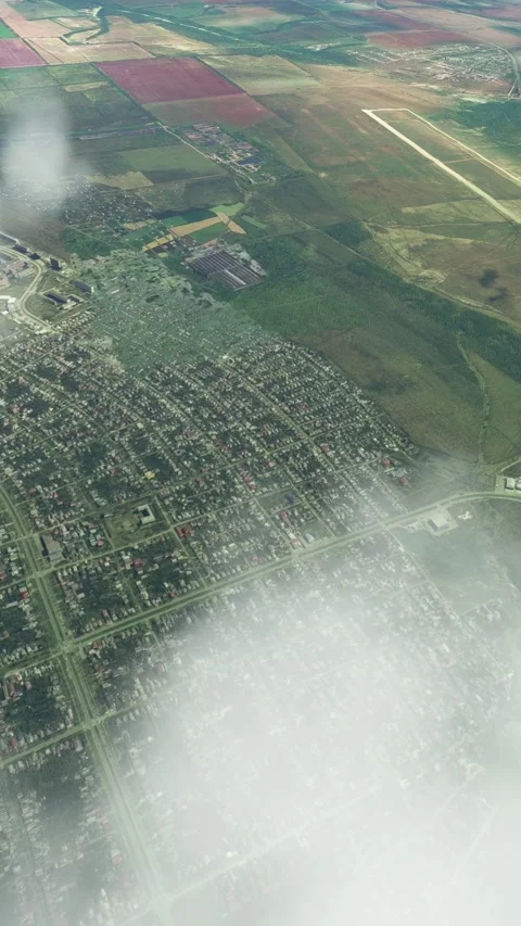 Aerial view flying over the clouds in the city of Luhansk in Ukraine Видео 284702609