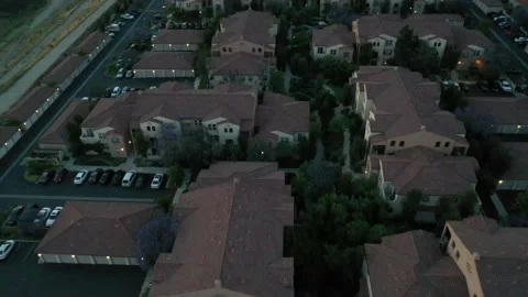 Aerial View Flying over Condos and Residential Buildings in the City Stock Footage 150935701